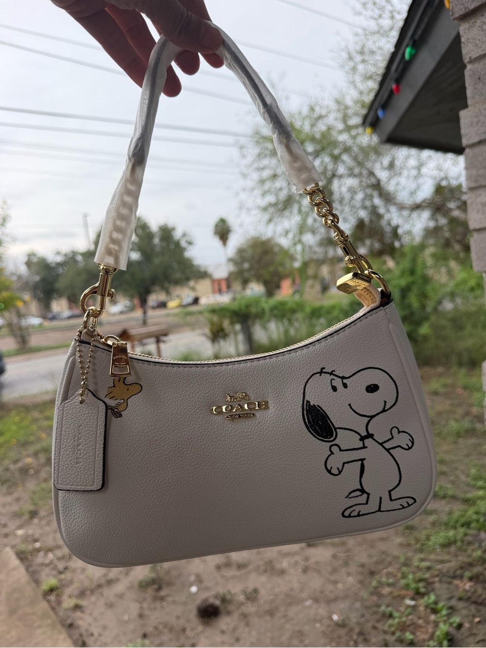 Coach Ivory Leather Shoulder Bag with Snoopy and Gold Hardware
